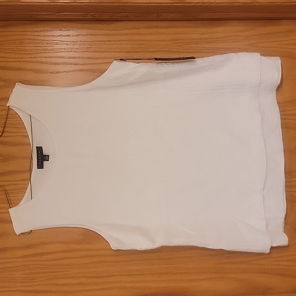 White sleeveless blouse